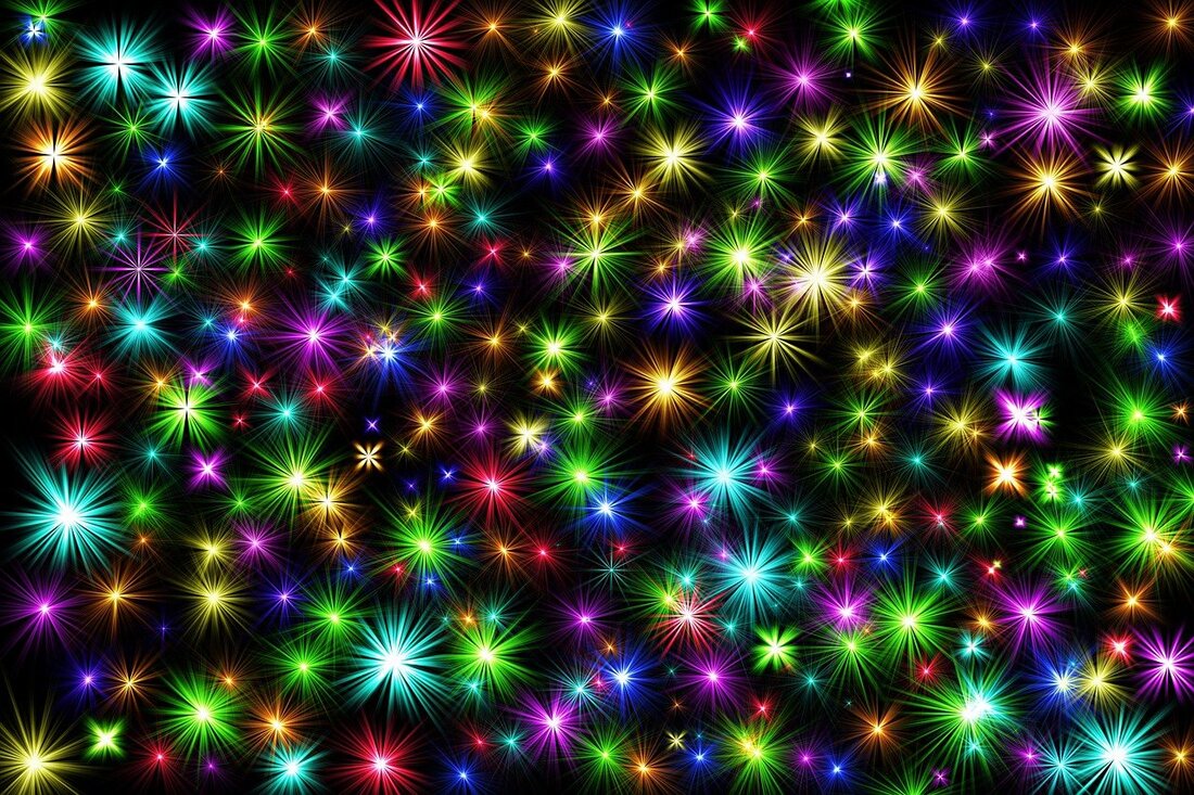 A dense pattern of multicoloured sparkling star-shaped lights glows against a black background.